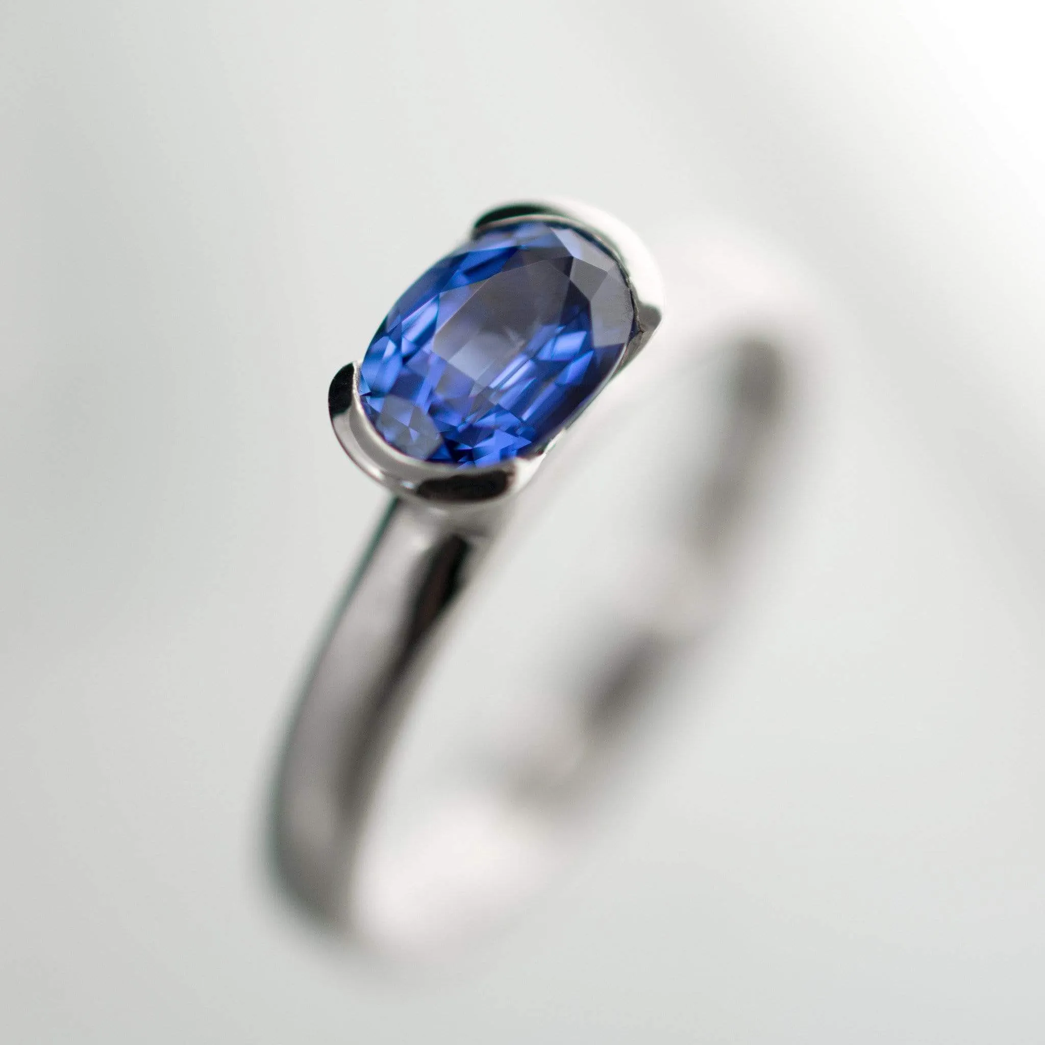 Chatham Lab Created Oval Blue Sapphire Half Bezel Solitaire Engagement Ring