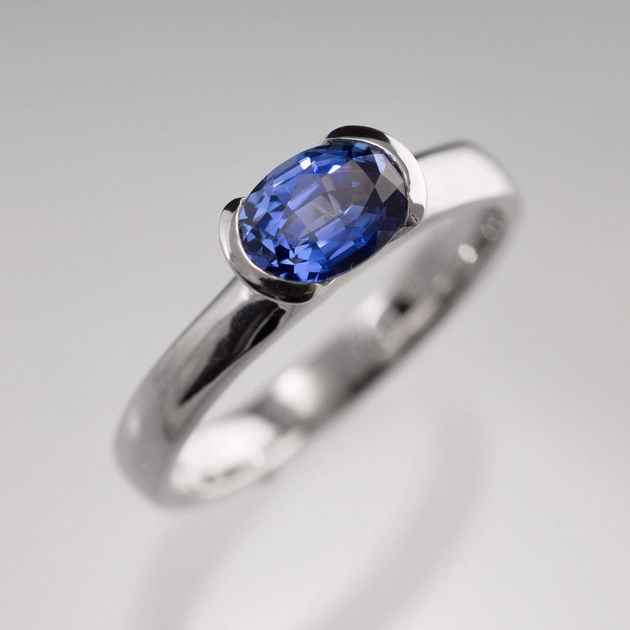 Chatham Lab Created Oval Blue Sapphire Half Bezel Solitaire Engagement Ring